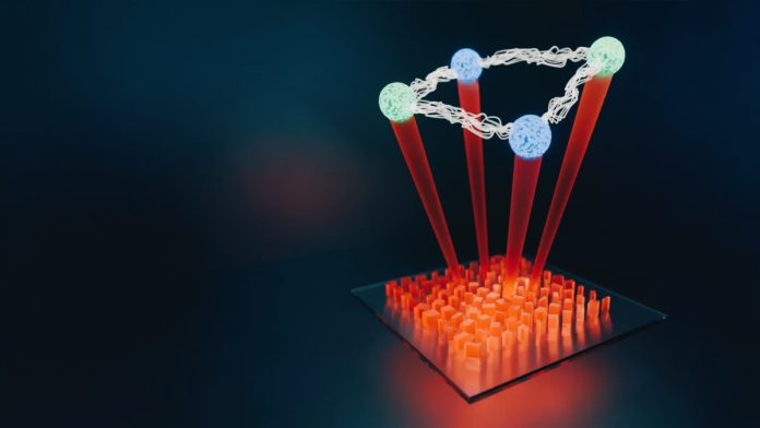 Come una metasuperficie quantistica ultrasottile condensa sistemi complessi